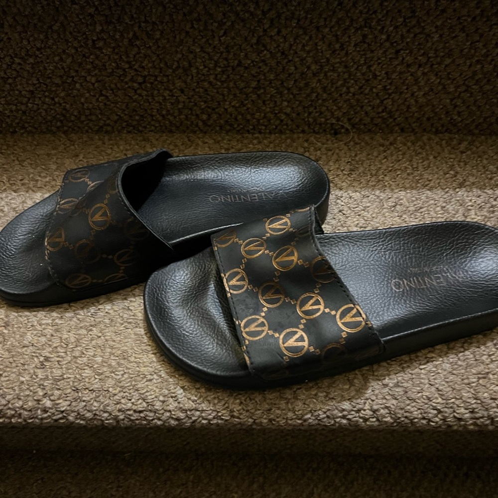 Valentino Women’s Black and Gold Slides